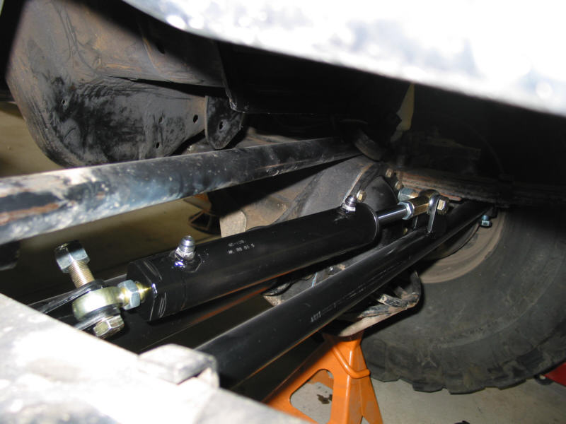 This ram angle is REALLY BAD!! This setup didn't last 10 minutes on the trail before all the jam nuts came loose and this thing was flopping all over the place. Be sure the ram is parallel to the tie rod!!!