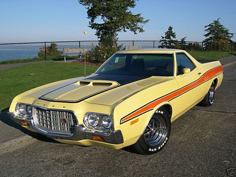 1973 Ford Ranchero - This 1973 Ford Ranchero features a distinctive yellow paint job with bold orange racing stripes and a black hood scoop.