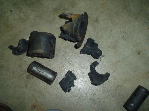 1984 Ford Bronco - These rubber bushings appear to be completely destroyed and separated from their metal components.