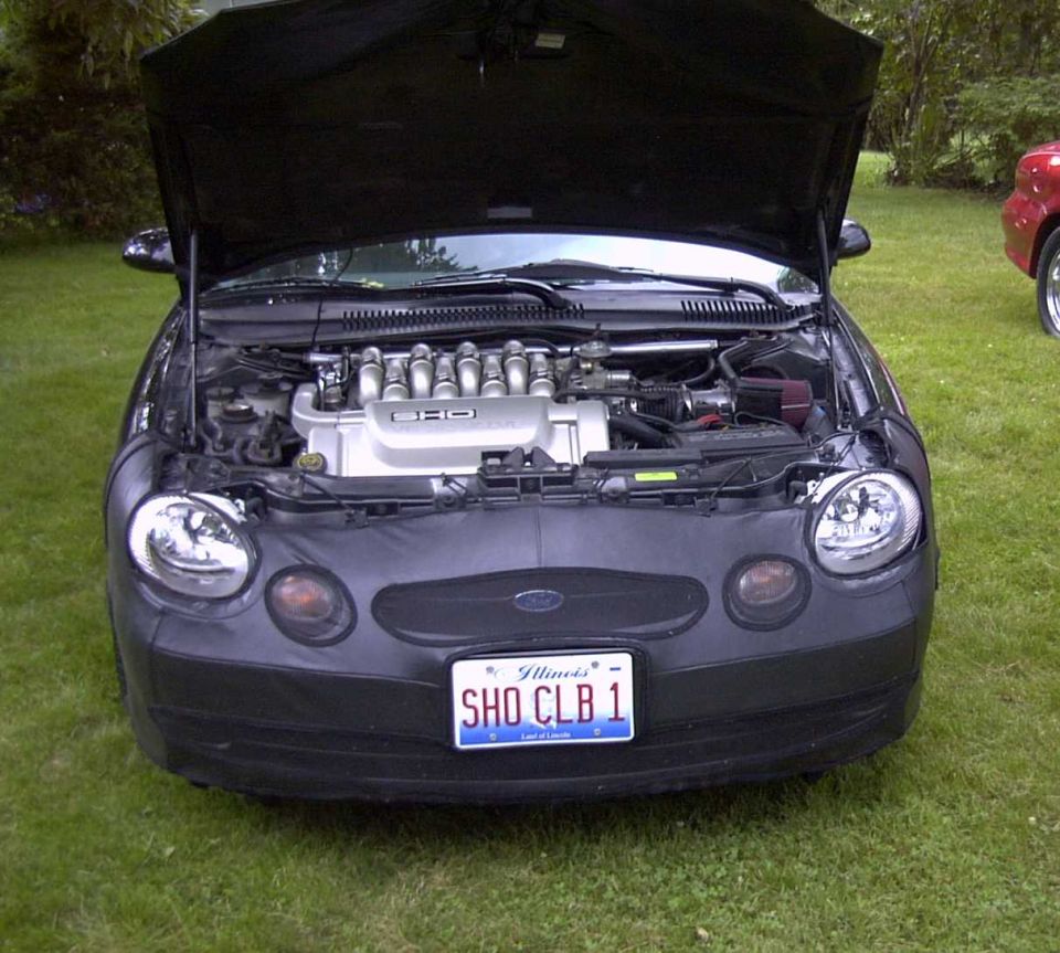 1997 Ford Taurus SHO with hood open, showing V8 engine. Illinois license plate reads SHO CLB 1