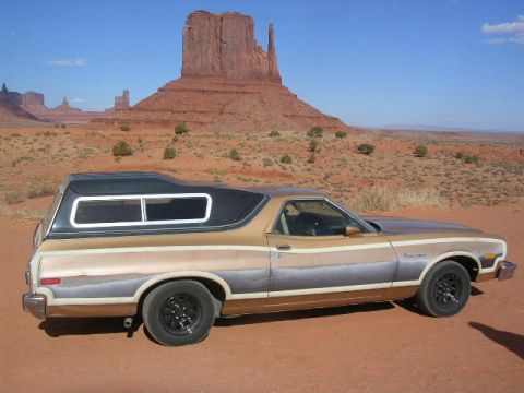 1975 Ford Ranchero - A 1975 Ford Ranchero with a camper shell is parked in Monument Valley, Arizona.