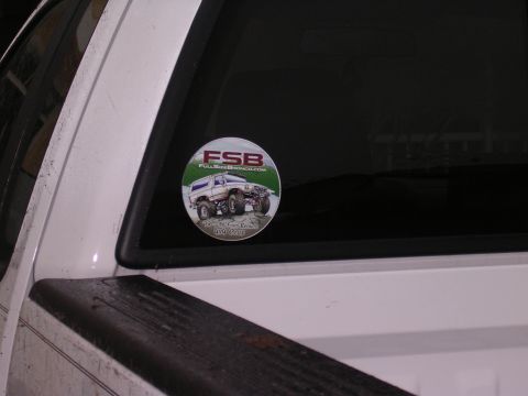 2006 Ford F-150 - Sticker on a vehicle window shows a lifted Bronco with text.