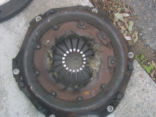 worn clutch assembly with frayed material