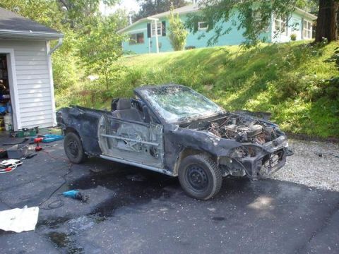 2006 Ford E350 - Aftermath of the hatchback destruction.