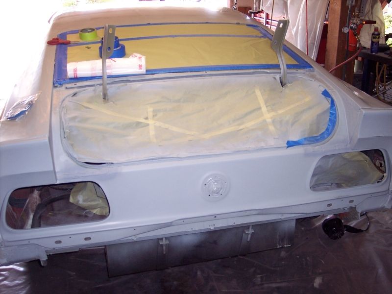 1971 Ford Mustang rear end, masked and primed for paint. Trunk lid is open