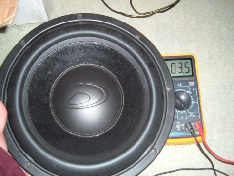2006 Ford E350 - Testing a subwoofer with a multimeter. The reading is 03.5.