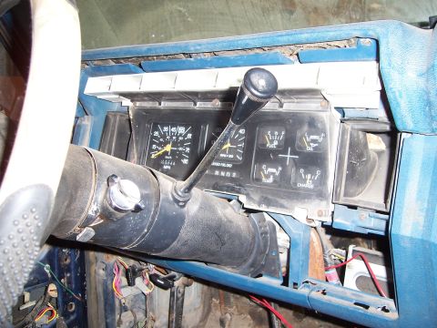 1983 Ford Bronco - Interior view of a 1983 Ford Bronco dashboard, showing the instrument cluster and steering column.