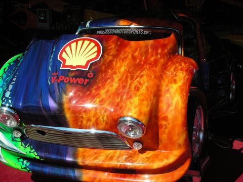 1998 Ford Crown Victoria - front of a small custom car painted with flame and graphic artwork, hood carrying a Shell V-Power logo and Ireson Motorsports decal.