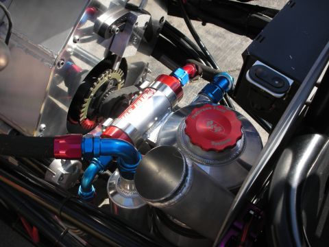 1998 Ford Crown Victoria - Detail of polished engine components with red and blue anodized AN fittings and a Peterson Fluid Systems oil tank cap.