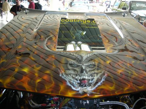 1998 Ford Crown Victoria - custom hood displays an airbrushed snarling demon face in flames with a cut-out scoop revealing chrome velocity stacks.