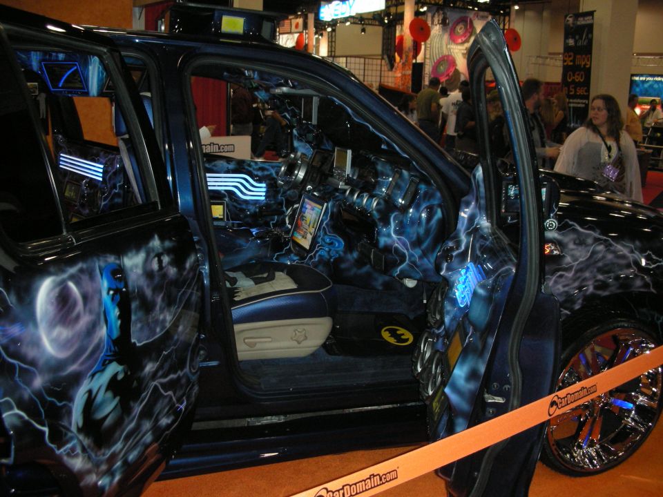 Custom Batman-themed truck interior with airbrushed graphics and screens