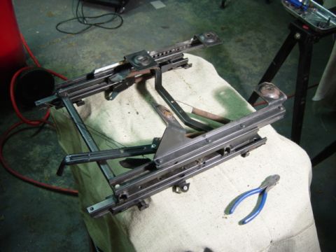 1991 Ford Bronco - More careful measuring, cutting, and filing will get the forward leg in the right place, too. There's not enough room in the truck floorpan…