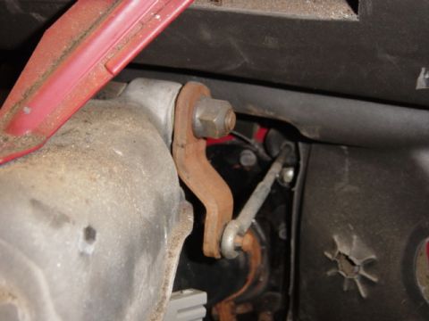 1991 Ford Bronco - Detail of a mechanical linkage, possibly from a vehicle's interior or engine bay.