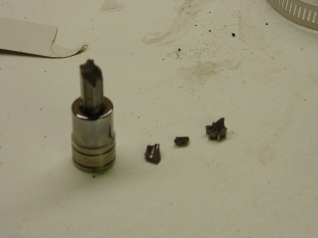 It's a bad sign when you shatter a Snap-On tool.  I hate Torx bolts.  I've got to give our Snap-On guy credit for going over and above when he found out, though ... I'm not used to having a tool salesman around who will jump out of his truck and come help me fight a stubborn bolt!  Even the Big Red Wrench (torch) didn't help this one, though, so I certainly can't blame the tool!