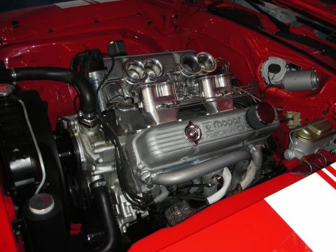 1998 Ford Crown Victoria - custom V8 with twin individual throttle bodies and a Mopar Performance valley cover sits in a red engine bay.