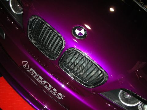 1998 Ford Crown Victoria - BMW twin kidney grilles with carbon-fiber surrounds and the roundel badge on a glossy purple front end.