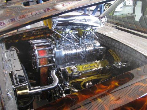 1998 Ford Crown Victoria - Customized engine bay a supercharger and flame paint job.