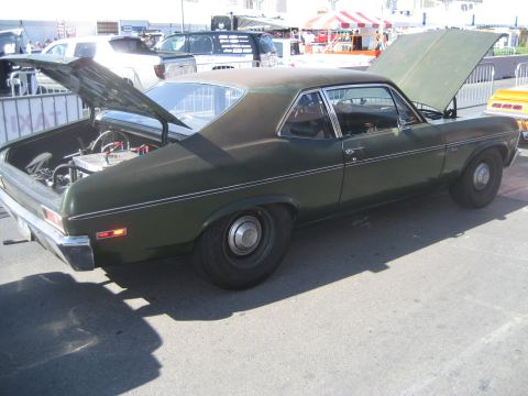 1998 Ford Crown Victoria - This 1970 Chevrolet Nova coupe has its hood and trunk open, revealing its engine and rear axle.
