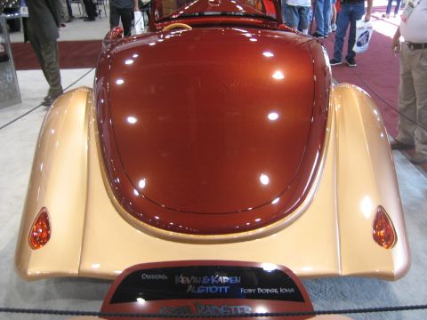 1998 Ford Crown Victoria - This custom roadster features a striking two-tone paint scheme and appears to be a show car.