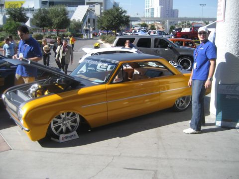1998 Ford Crown Victoria - This customized yellow coupe appears to be from 1956, not 1998.