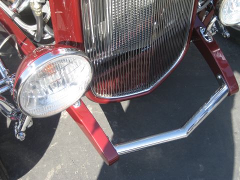 1998 Ford Crown Victoria - Front view of a custom hot rod showing its chrome grille and headlight assembly.