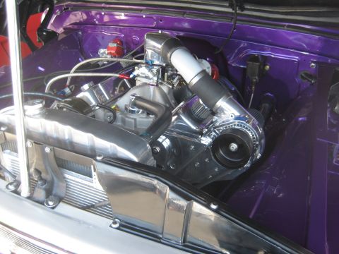 1998 Ford Crown Victoria - Engine bay features a polished supercharger and custom purple paintwork.