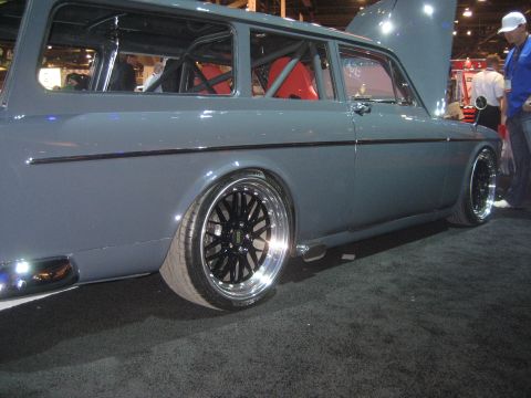 1998 Ford Crown Victoria - This custom wagon features a roll cage and racing seats, sitting low on aftermarket wheels.