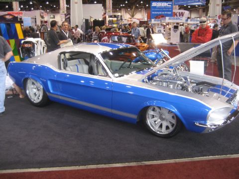 1998 Ford Crown Victoria - Custom blue and silver coupe displayed with its hood open, revealing a detailed engine bay.