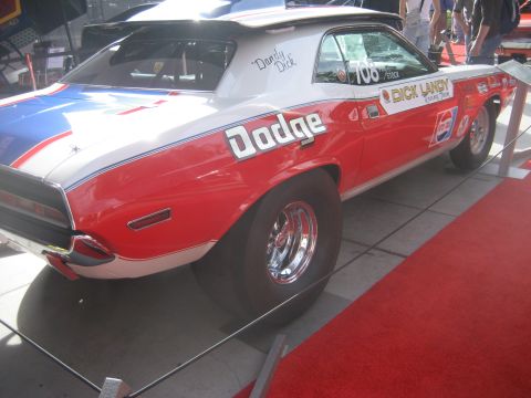 1998 Ford Crown Victoria - This Dodge Challenger is set up for drag racing with wide rear tires and sponsor decals.