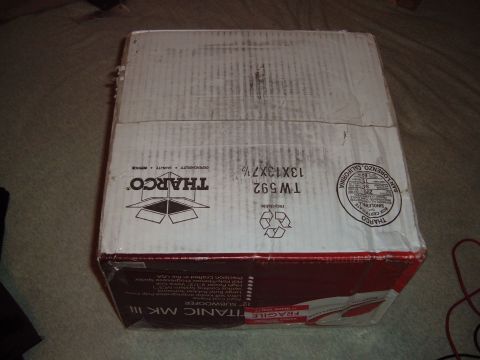 2006 Ford E350 - Cardboard box for a Titanic Mk III 12-inch subwoofer, manufactured by Tharco.