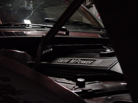 1984 BMW 3 Series - Close-up of the engine bay showing the BMW M Power engine cover.