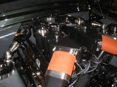 1998 Ford Crown Victoria - Custom engine bay features polished chrome and black components with bright orange hoses.