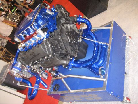 1998 Ford Crown Victoria - Custom engine build bright blue piping and a polished intake manifold.