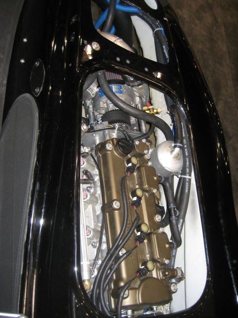 1998 Ford Crown Victoria - Close-up view of an engine compartment, showing complex mechanical components and wiring.