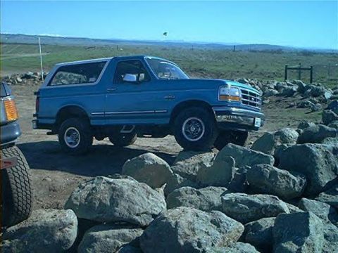 1988 Ford Bronco - littleone gearrats better half stock 94 with sway bars removed, will be all tricked out if they can keep the 87 runnin!!!