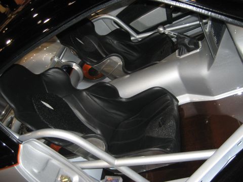 1998 Ford Crown Victoria - Interior view of racing seats and roll cage, not a 1998 Ford Crown Victoria.
