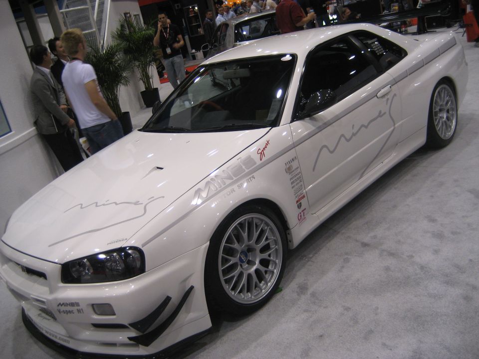 White Nissan Skyline GT-R front three-quarter with Mine's signature graphics