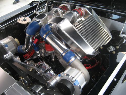 1998 Ford Crown Victoria - Custom engine bay modifications with prominent turbochargers and intercoolers are visible.