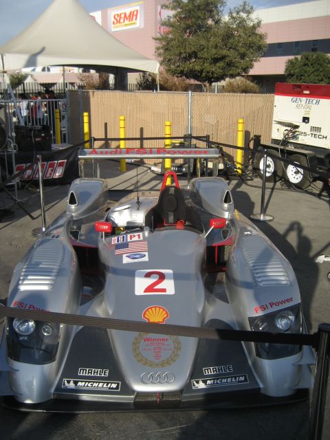 1998 Ford Crown Victoria - This Audi R10 TDI race car, identified by its number 2 and Shell sponsorship, is displayed at an event.