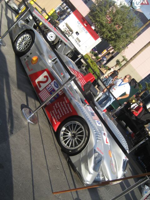 1998 Ford Crown Victoria - Silver racing car with various sponsor decals and the number 2 prominently displayed.
