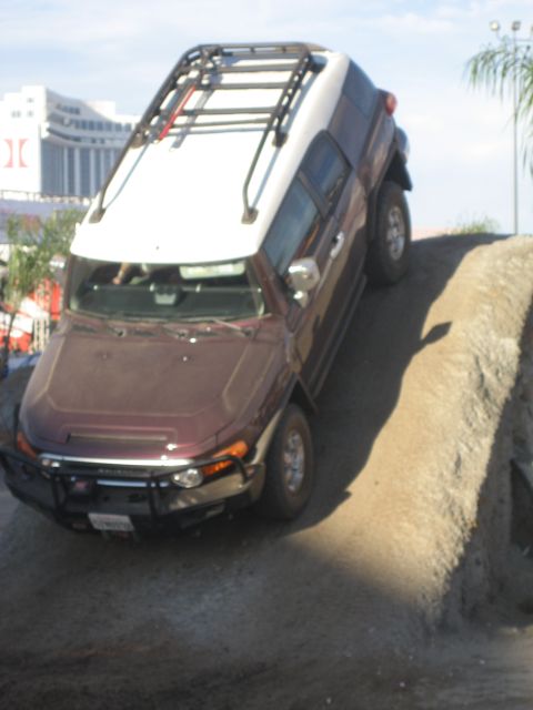 1998 Ford Crown Victoria - This off-road SUV is navigating a challenging dirt path, its capabilities.