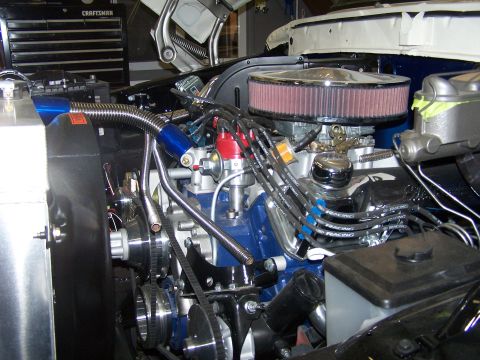 1978 Ford Bronco - Close-up view of a vehicle's engine bay, showing various components and wiring.