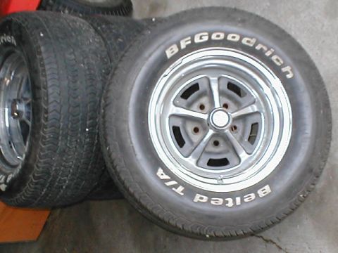1973 Ford Ranchero - BFGoodrich Radial T/A tires mounted on chrome five-spoke wheels are stacked.
