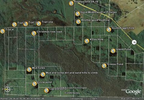 1989 Ford Bronco - Satellite view of an off-road area with marked trails and points of interest like mudholes and ponds.