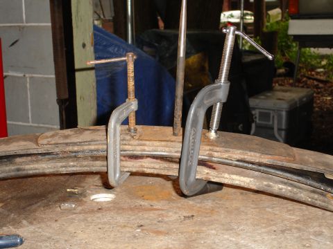 1989 Ford Bronco - Leaf springs are clamped down for modification or repair.