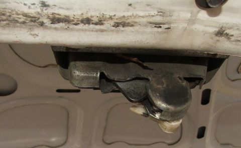 1985 Ford Crown Victoria LTD - The trunk latch mechanism is a critical component for securing the rear storage area of a vehicle.