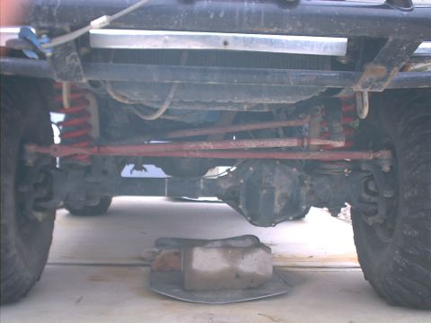 1978 Ford Bronco - This image shows the undercarriage of a vehicle, focusing on the suspension and differential components.