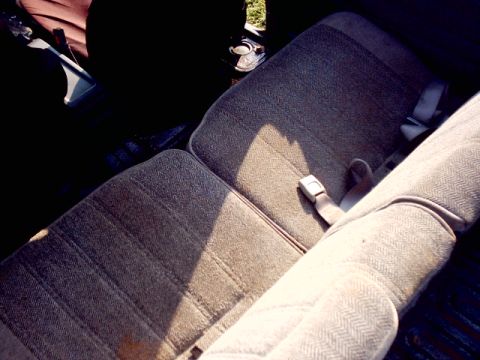 1988 Toyota 4Runner - Interior view of vehicle seats with sunlight casting shadows.