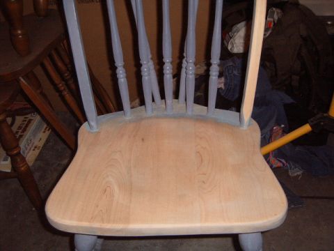 1988 Ford Bronco - A chair is shown with its seat and back spindles, some painted gray and some unfinished wood.