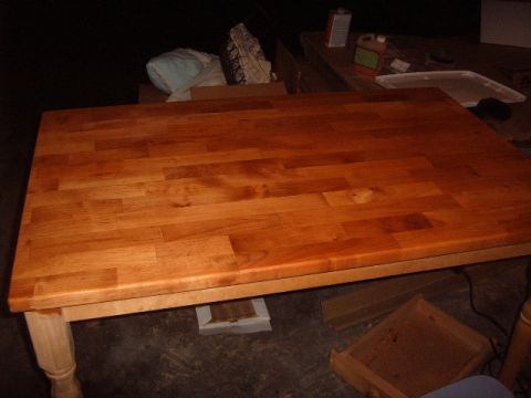 1988 Ford Bronco - A wooden table with a butcher block top is shown, with finishing supplies in the background.